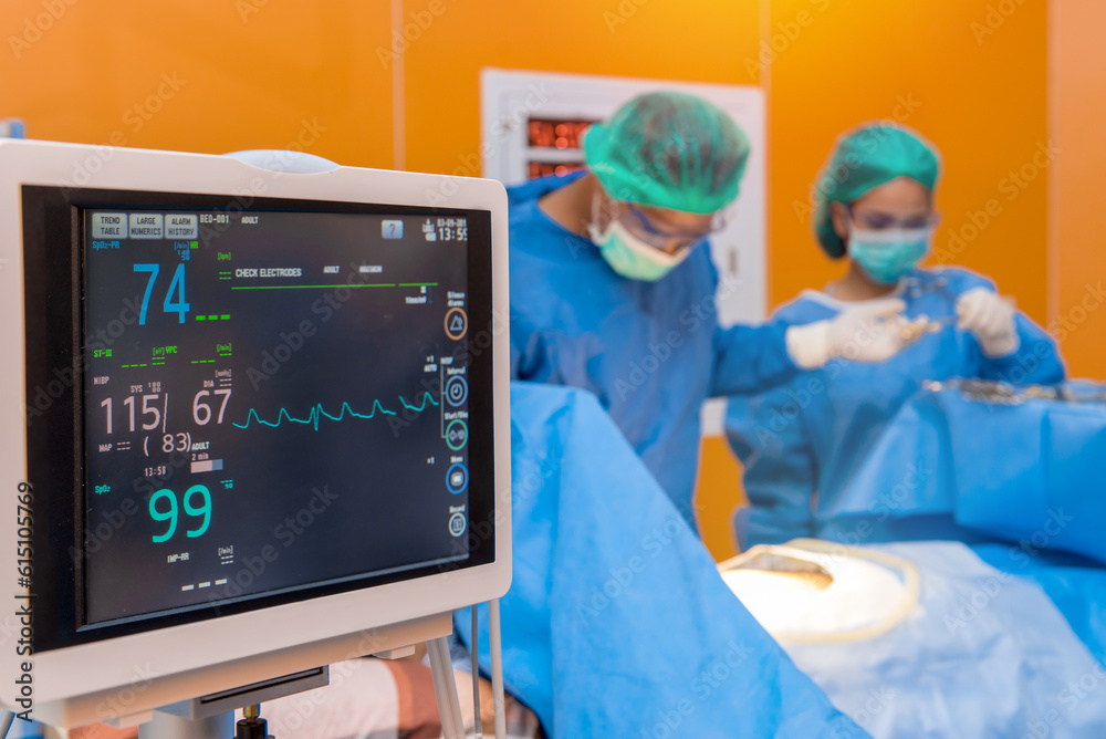 Defibrillator with Medical physician doctor or Surgery team in ICU operation room at hospital Defibrillator with Medical physician doctor or Surgery team in ICU operation room at hospital