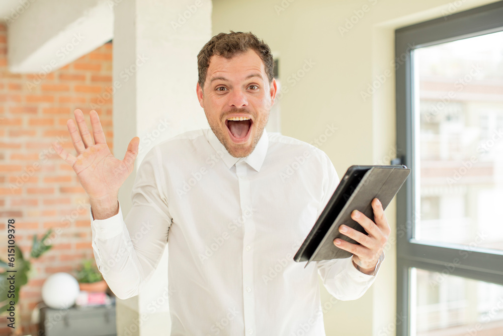 feeling happy and astonished at something unbelievable. touch screen concept feeling happy and astonished at something unbelievable. touch screen concept