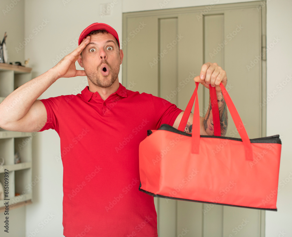looking happy, astonished and surprised. pizza delivery take away