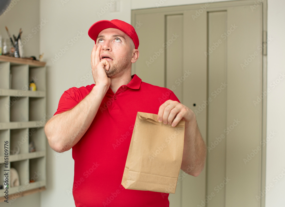 feeling bored, frustrated and sleepy after a tiresome. delivery paper bag concept feeling bored, frustrated and sleepy after a tiresome. delivery paper bag concept