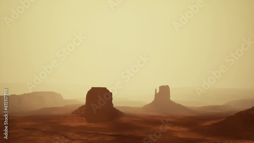 Sunset at the sisters in Monument Valley
