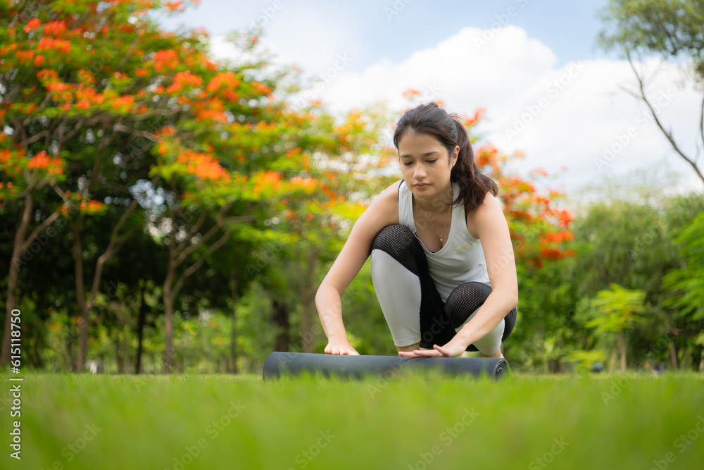 Young female with outdoor activities in the city park, Yoga is her chosen activity. Young female with outdoor activities in the city park, Yoga is her chosen activity.