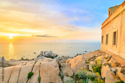 The old lighthouse at sunset on the Capo Testa peninsula, Sardinia, Italy