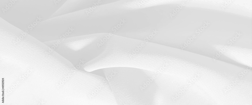 White fabric cloth background texture, white chiffon fabric draped with large folds, wave textile background, white satin silk, elegant fabric for backgrounds. White fabric cloth background texture, white chiffon fabric draped with large folds, wave textile background, white satin silk, elegant fabric for backgrounds.