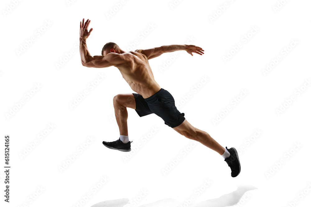 Competitive, motivated man, professional runner, sportsman in motion, training shirtless against white studio background