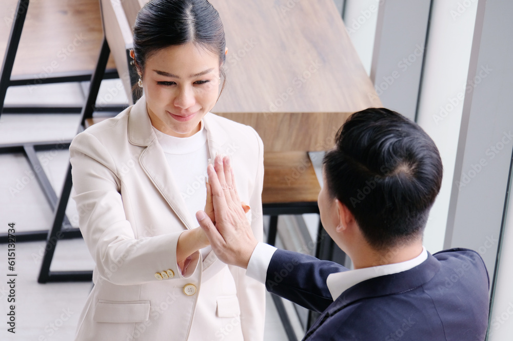 Smiling businessman touching hands congratulating business cooperation. Smiling businessman touching hands congratulating business cooperation.