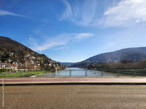 View from the bridge in front of the Neckar River, Heidelberg, Germany. on a clear sky day © Pingky
