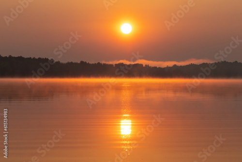 Obraz na płótnie sunrise over the river w salonie
