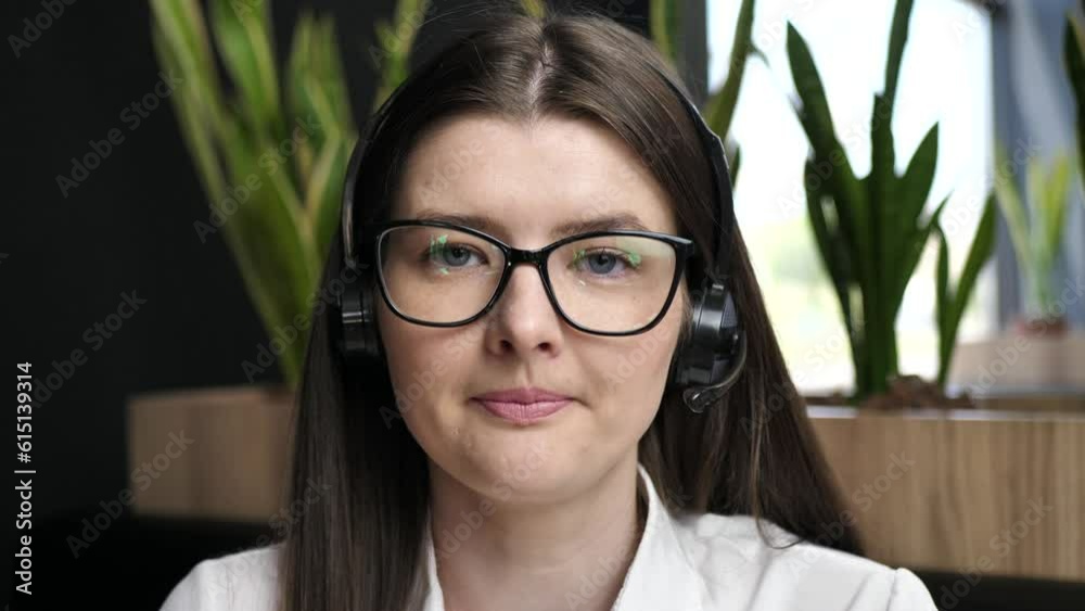 young woman business coach talking while looking at camera during webinar, online class, virtual meeting. webcam view young woman business coach talking while looking at camera during webinar, online class, virtual meeting. webcam view