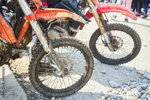 Fototapeta Naklejka Na Ścianę i Meble -  Motorsport, motorcycle wheel in the mud. Mountain motorcycling. Adventures on the track