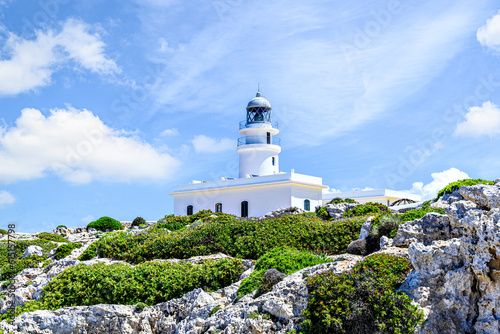 Cavalleria lighthouse located in Cabo de Cavalleria of Menorca, Balearic Islands, Spain photo