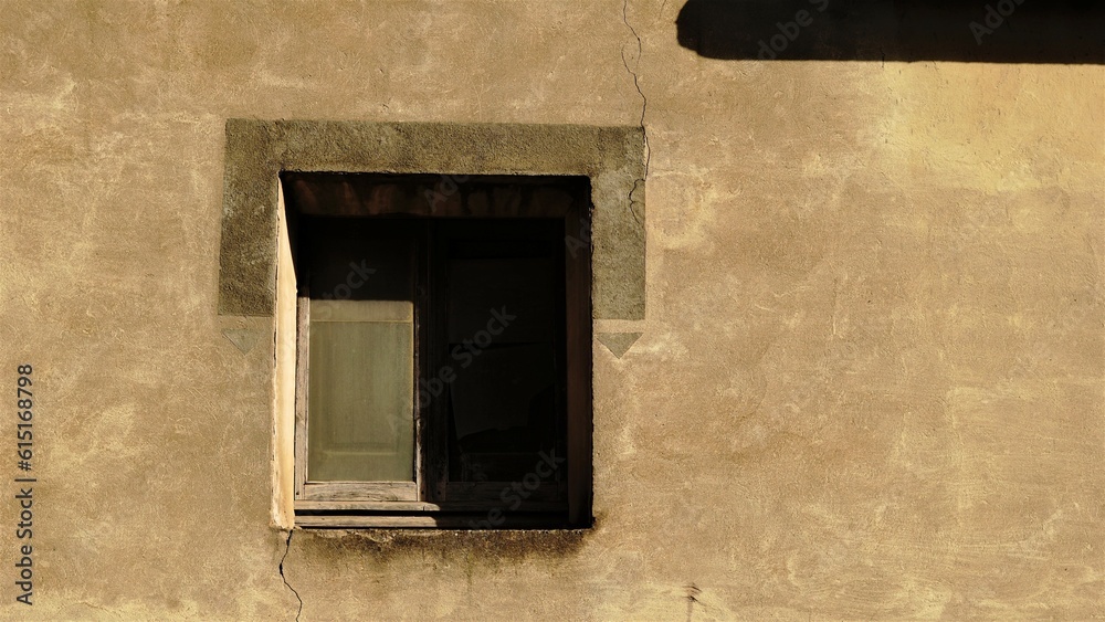 window in rustic facade in the background window in rustic facade in the background