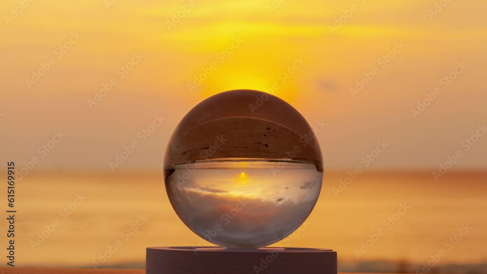.Magnificent sky above the crystal ball on the beach..The beautiful reflection of the sky above the crystal ball on the wet sand beach..Unique and creative travel and nature idea videos 4K clips.. .Magnificent sky above the crystal ball on the beach..The beautiful reflection of the sky above the crystal ball on the wet sand beach..Unique and creative travel and nature idea videos 4K clips..