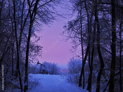 Winter landscape in Russia.  Blue hour.  Oil pumping station in winter.