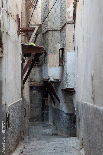 Street scene in the Casbah of Algiers (Alger), Algeria. Stone stairs and ancient ottoman houses. Narrow street