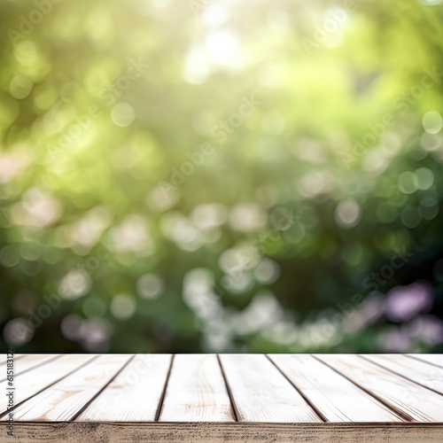 Wooden white table top on blur green nature garden bokeh background. High quality photo
