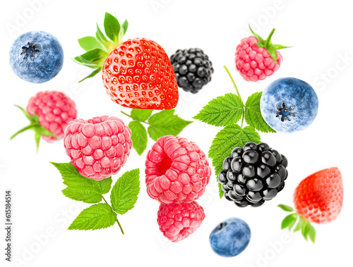 levitating raspberries and blackberries blueberries and strawberries on a white isolated background