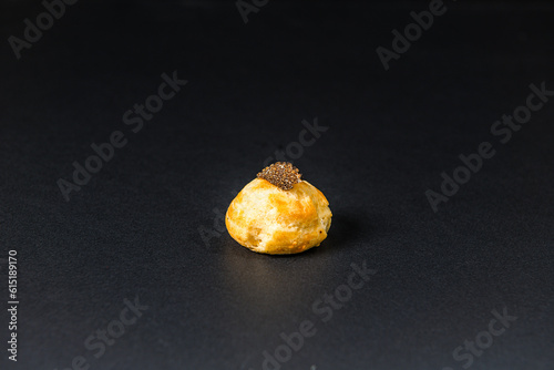 Gastronomic appetizer isolated on a black background