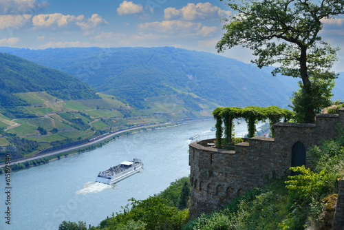 Tableau sur toile Sooneck Castle, Ferry cruising, white tourist ship on river rhine in valley amon