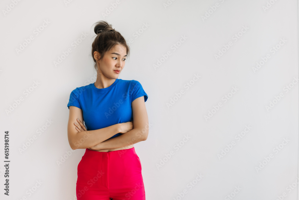 Asian woman in colorful clothes feeling hesitate isolated on white. Asian woman in colorful clothes feeling hesitate isolated on white.
