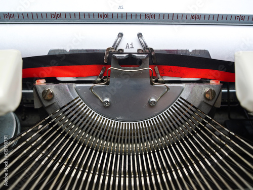 Typing Ai letter on old typewriter