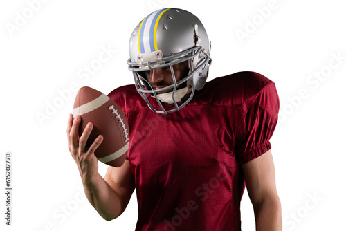 Digital png photo of hispanic rugby player holding ball on transparent background