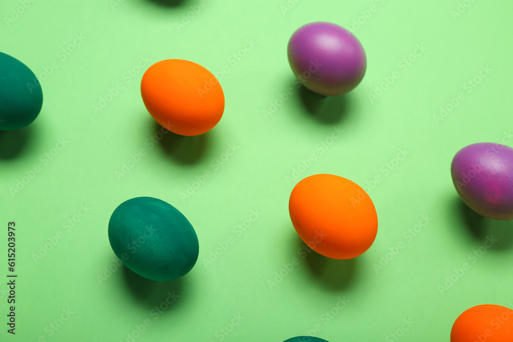 Painted Easter eggs on green background Painted Easter eggs on green background