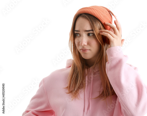 Sad young woman in headphon...