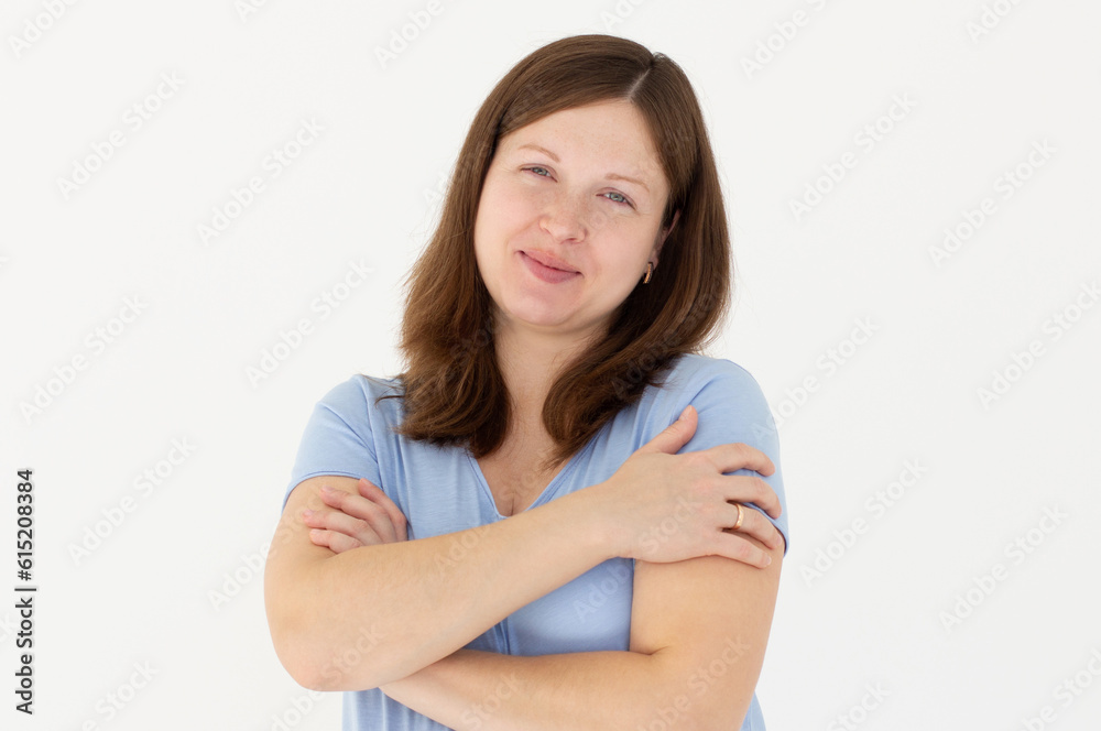 Photo of overjoyed pregnant lady good mood hands hug herself shoulders enjoy joyful smile wear blue t-shirt isolated white color background Photo of overjoyed pregnant lady good mood hands hug herself shoulders enjoy joyful smile wear blue t-shirt isolated white color background
