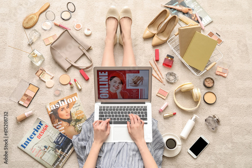 Woman with laptop, makeup p...