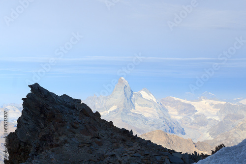 Panorama view with mountain Matterhorn seen from Allalinhorn in Pennine Alps, Switzerland photo