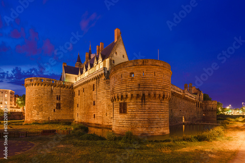 View at night of the Castle of the Dukes of Brittany in Nantes, France