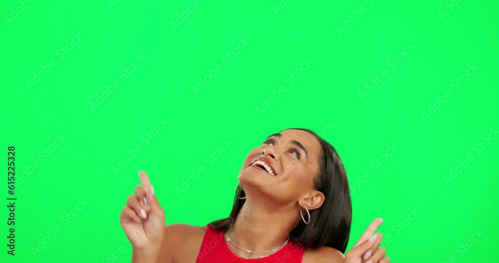 Happy woman, dancing and pointing on green screen for advertising against a studio background. Portrait of excited female person in dance for advertisement, sale discount or notification on mockup