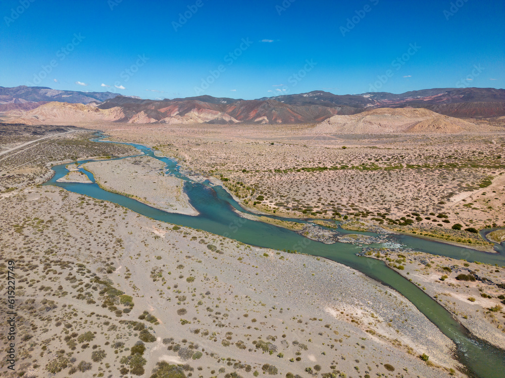 Aerial view of the remote and scenic nature with branches of the river Rio Grande along the famous Ruta40 in Mendoza Province in Argentina - Traveling South America 