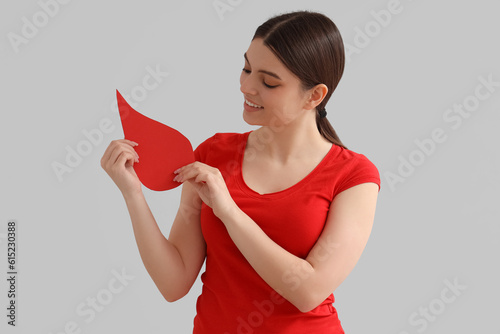 Female donor with paper blo...