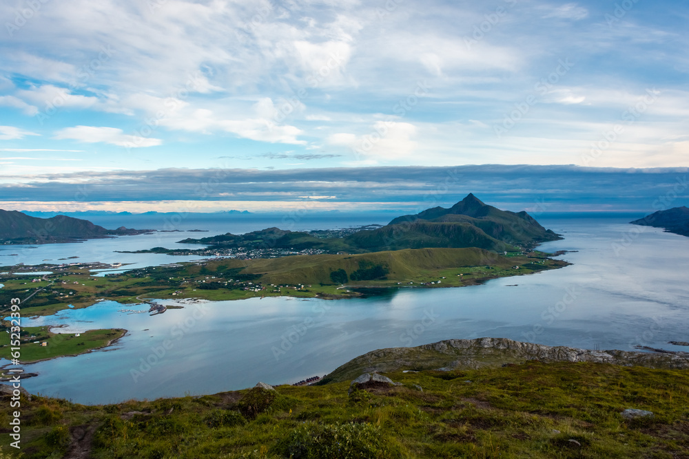 Beautiful landscape of the Lofoten Islands during the golden hour, view from Offersoy Mount trail,  Norway
