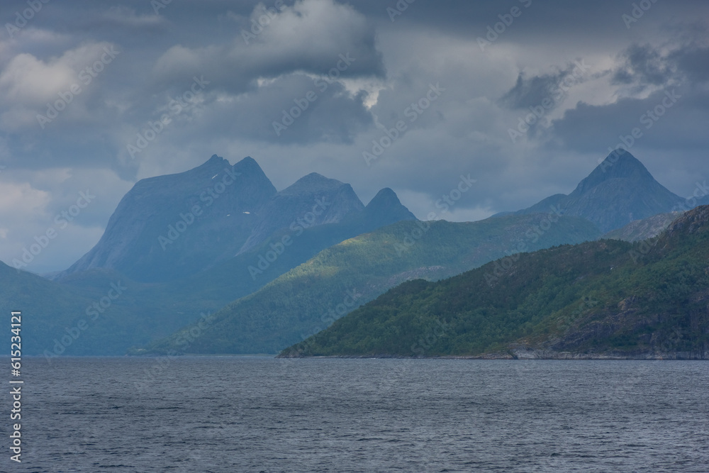Beautiful view over a Norwegian fjord from the sea Beautiful view over a Norwegian fjord from the sea