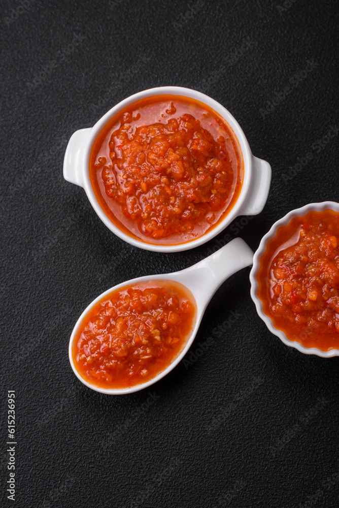 Delicious spicy tomato sauce with pepper, garlic, salt, spices and herbs Delicious spicy tomato sauce with pepper, garlic, salt, spices and herbs