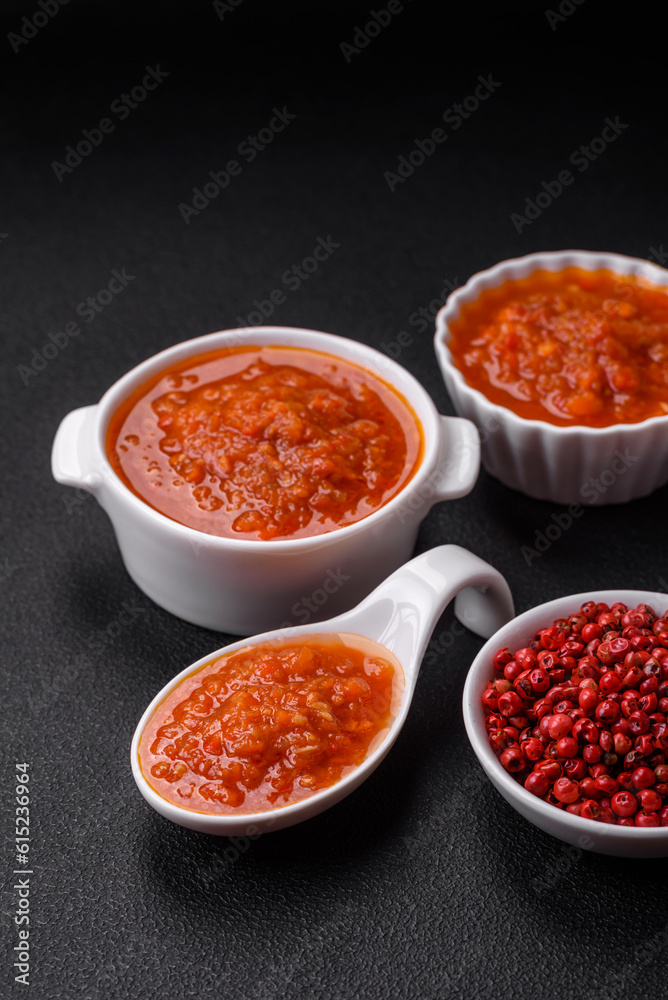 Delicious spicy tomato sauce with pepper, garlic, salt, spices and herbs Delicious spicy tomato sauce with pepper, garlic, salt, spices and herbs