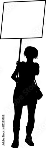 Protestor or demonstrator at a demonstration march, picket line or strike protest rally in silhouette. Holding up a banner or picket sign board placard.