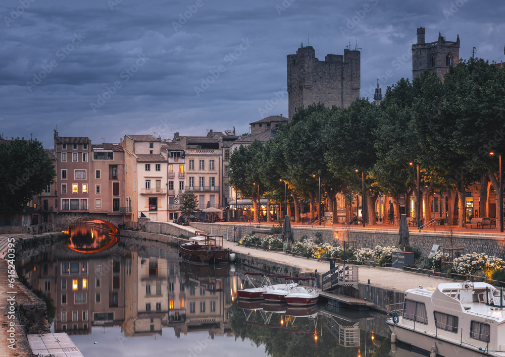 Historic old town of Narbonne with canal, France