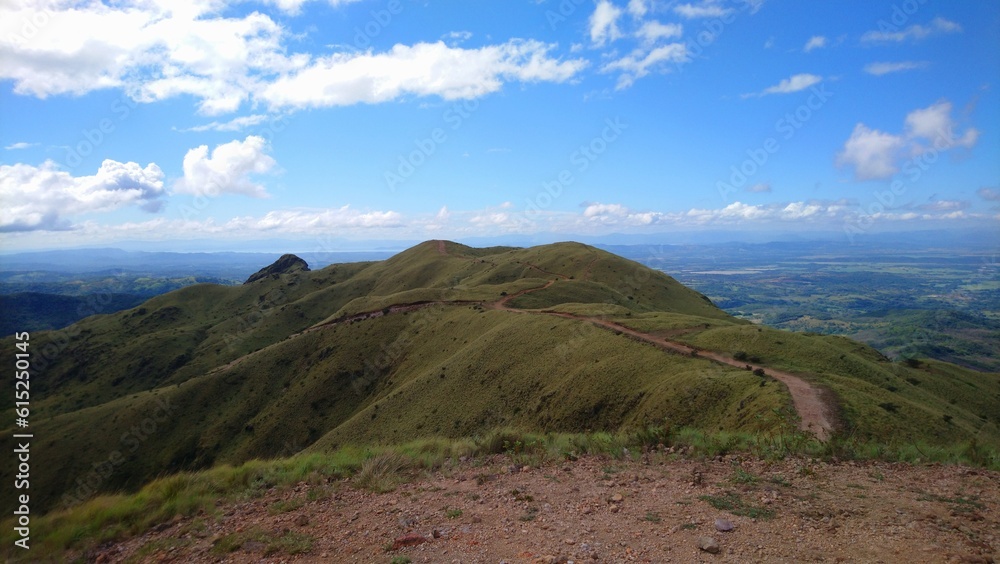 Calming vistas from a bald mountain in central america during a day with clear skies