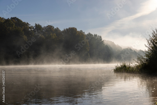 Fog-covered river in the autumn season © rsooll