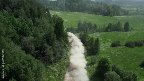 Drift rally car in the forest on a dusty road