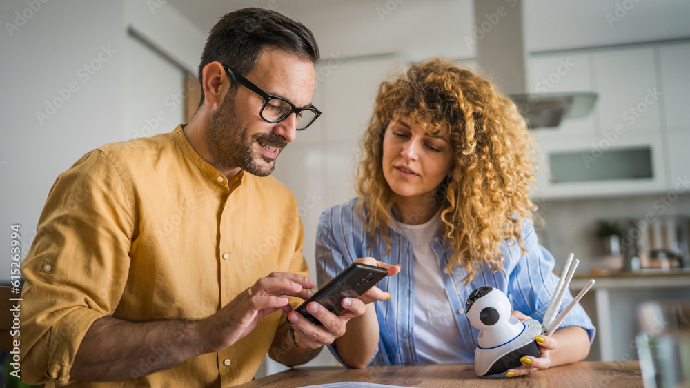 Couple at home connect and install cctv security surveillance camera Couple at home connect and install cctv security surveillance camera