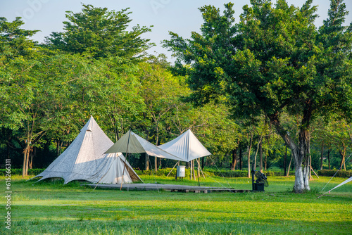 Tents on the Camping Grassland in the Morning Park © zhonghui