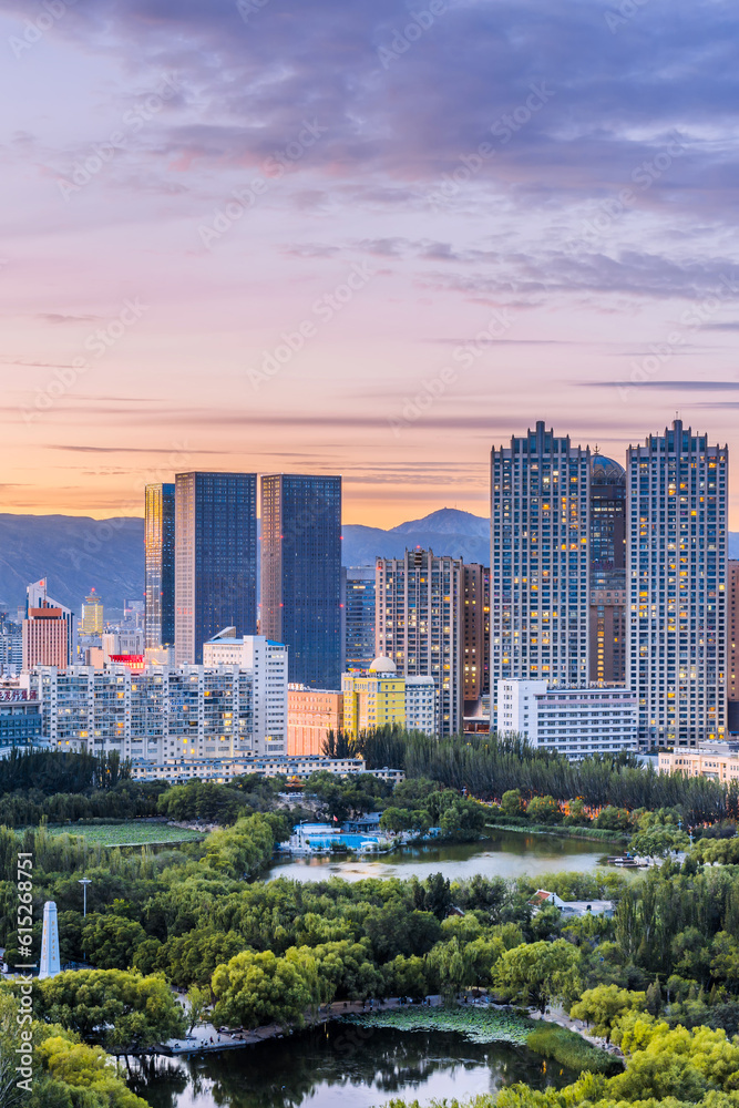 Obraz premium Night view of Qingcheng Park and skyline in Hohhot, Inner Mongolia, China
