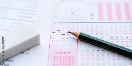 Exam answer sheet and a pencil