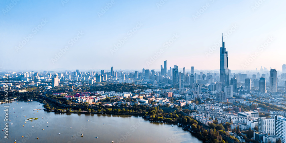 Aerial shot of cruise ship and city skyline on Xuanwu Lake, Nanjing, China