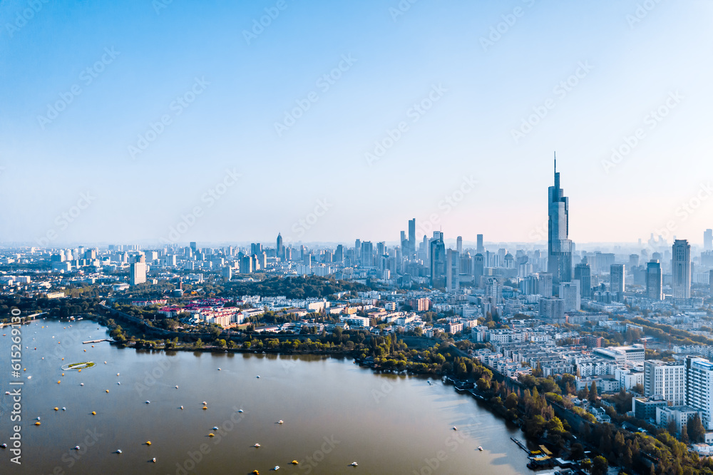 Aerial shot of cruise ship and city skyline on Xuanwu Lake, Nanjing, China